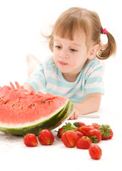 little girl with strawberry and watermelon