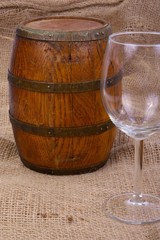 old barrel with glass of wine