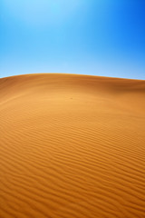 sand dunes and cloudless sky