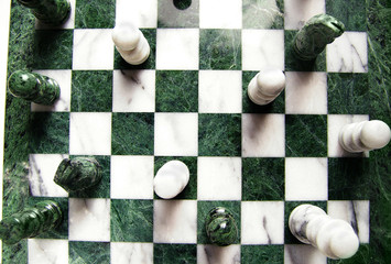 shot from above of chess pieces and board