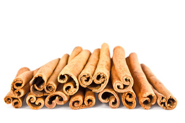 Sticks cinnamon close up on the white