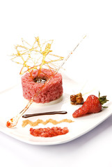 Postre de arroz inflado bañado con caramelo de fresa. México.