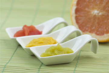 three tablespoons of mashed fruit colorful