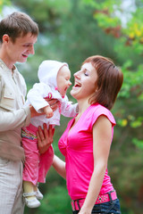 happy family on natural background