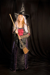 Obraz premium Halloween Witch with Stick Broom