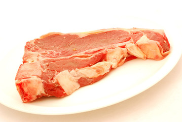 Raw t-bone steak