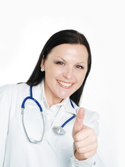 smiling female doctor show thumb up sign