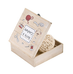fancy wooden sewing box with clew in it
