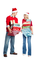 Christmas shopping couple carrying gifts