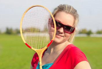 woman with badminton racquet