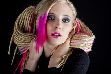 portrait of young woman with dreadlocks