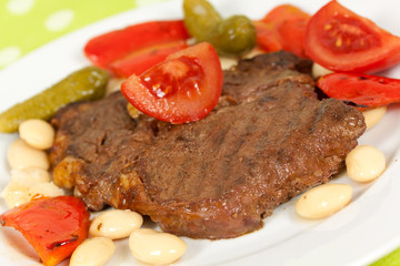 Schweine - steak mit Bohnen,Pprika