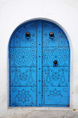 White Wall With Blue Door