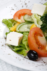 Caesar salad in a white plate