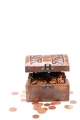 A wooden ancient chest full of money..