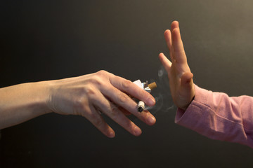 cigarette for child - hands