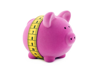 Piggy bank with measure tape. Clipping path included.