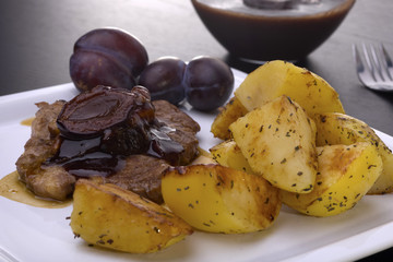 Tasty dinner of pork and prunes