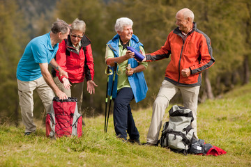 four senior hikers enjoying their day