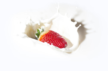 Strawberry with cream splashes