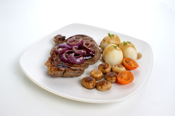 grilled rump steak and bacon with potato and sauce