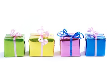 gift boxes of different colors on white background