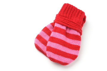 Obraz na płótnie Canvas Woolen baby mittens tied together