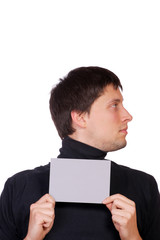 happy male holding a grey blank card