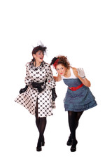 Two Fashion girls posing on white background