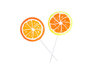 Orange and lemon lollipops isolated