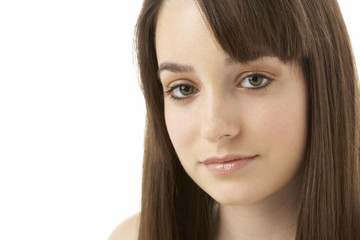 Fototapeta premium Studio Portrait Of Teenage Girl On White Background