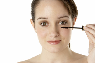 Teenage Girl Applying Make Up