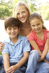 Mother With Children In Park