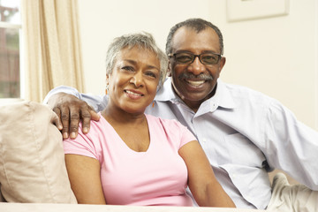 Senior Couple Relaxing At Home Together