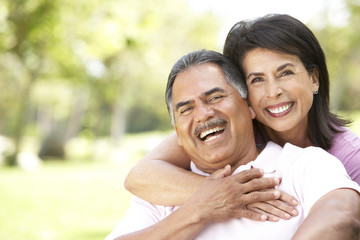 Portrait Of Senior Couple In Park