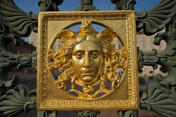 Face on the Royal Palace of Turin's gate
