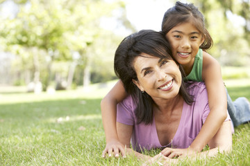 Grandmother With Granddaughter In Park