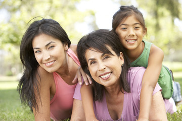 Fototapeta premium Grandmother With Daughter And Granddaughter In Park