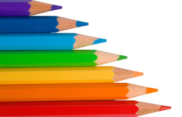 Seven color pencils of rainbow colors (isolated on white)