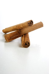 organic cinnamon sticks on a white background