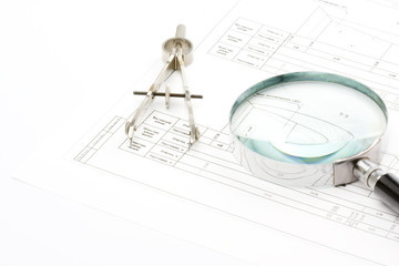 Tools of the designer on the drawing isolated on white backgroun