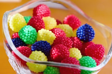 Tasty, chewy, sweet bonbon in glass cup
