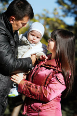 happy family on natural background