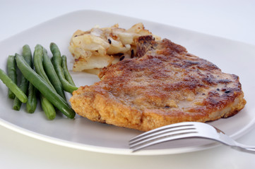 cutlet with organic beans and roasted potato