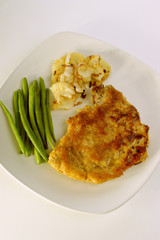 cutlet with organic beans and roasted potato