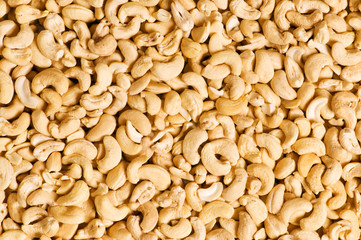 Cashew nuts arranged at the background