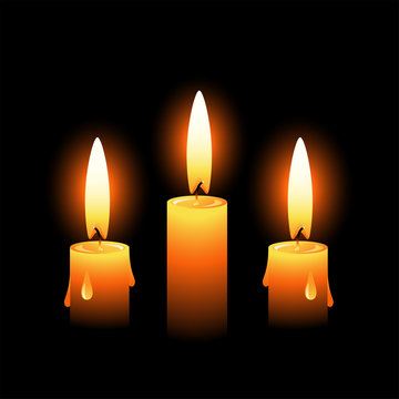 Three vector candles on a black background