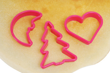 three plastic figure lie on slapjack