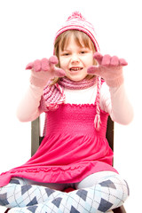 little girl wearing cap and gloves isolated on white