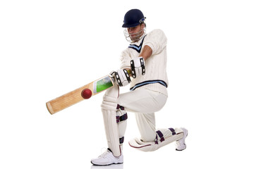 Cricketer playing a shot - 17932346